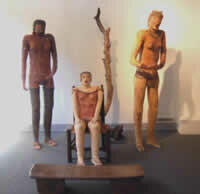 "Sitting woman" clay and mixed media, 40" x 14" x 13", 2002